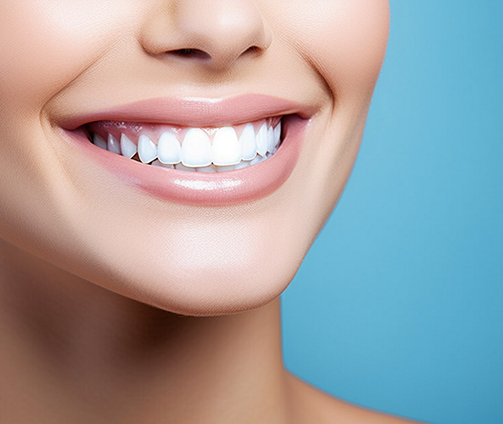 Close up of a person smiling with flawless teeth